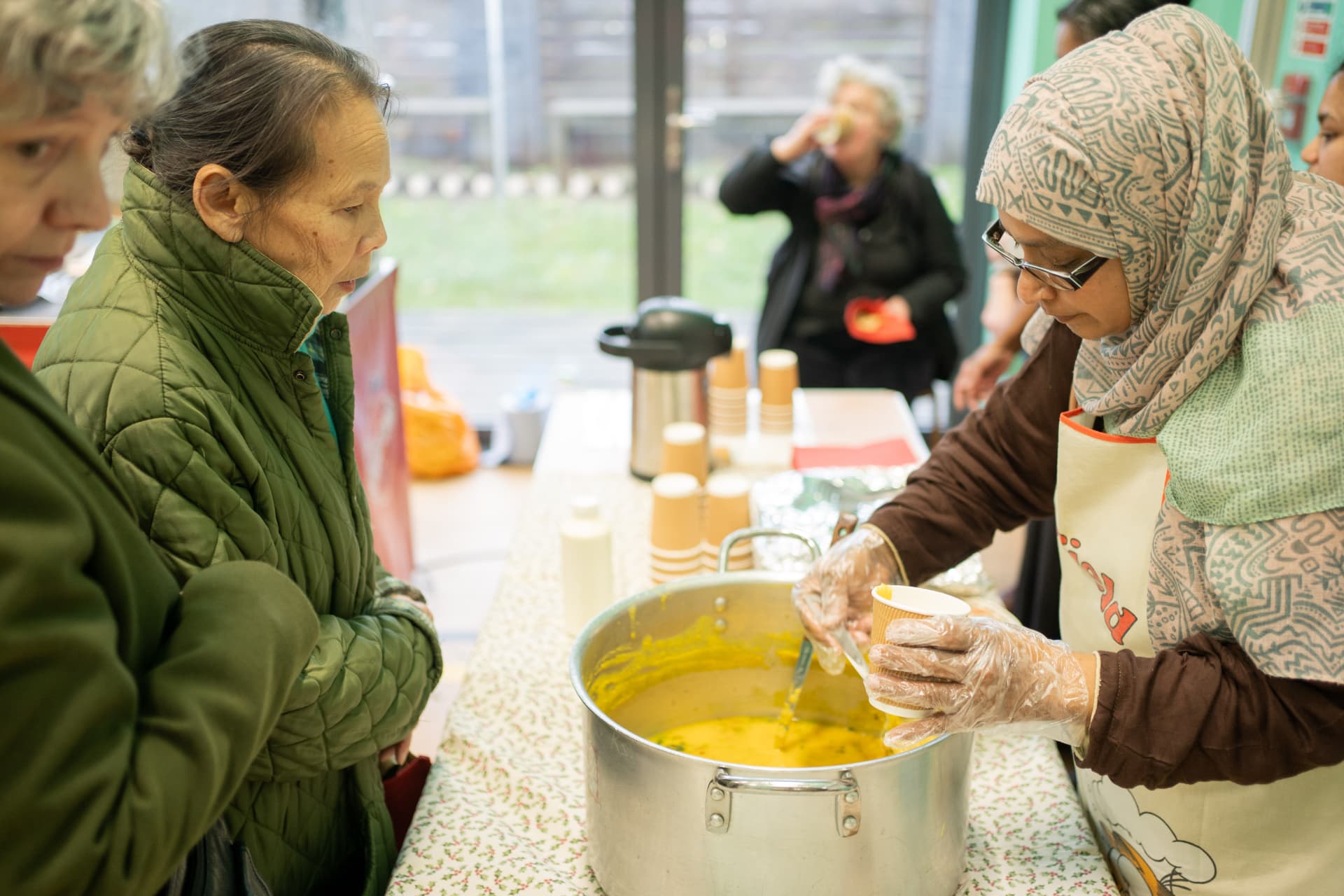 Residents being served soup at the Clapham Park winter event